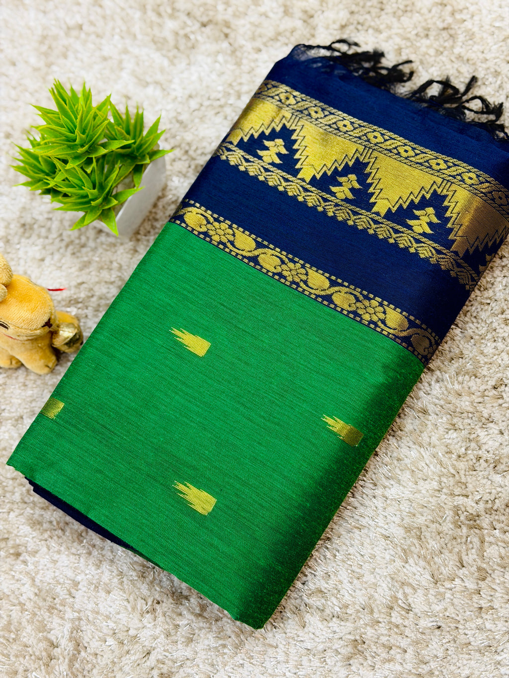 Elegant Green Saree with Navy Blue Border